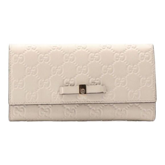 GUCCI Guccisima White Calfskin
Leather Bow Wallet Full Inclusion - Picture 2 of 13